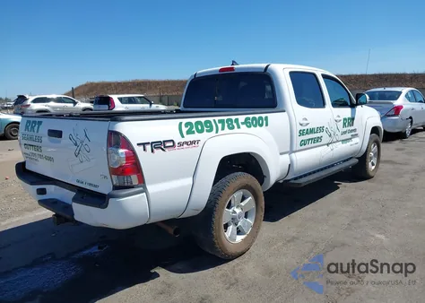 2015 Toyota Tacoma V6 из США, поврежденный, VIN 5TFMU4FN1FX031189